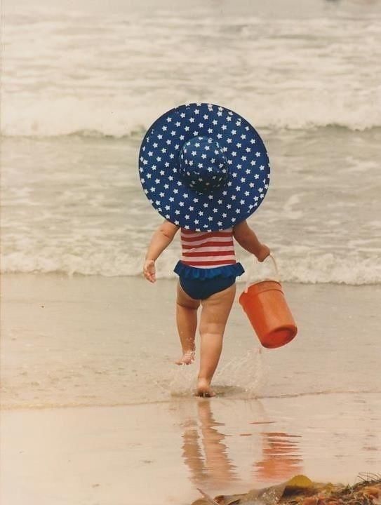 Children- Patriotic little girl at the beach